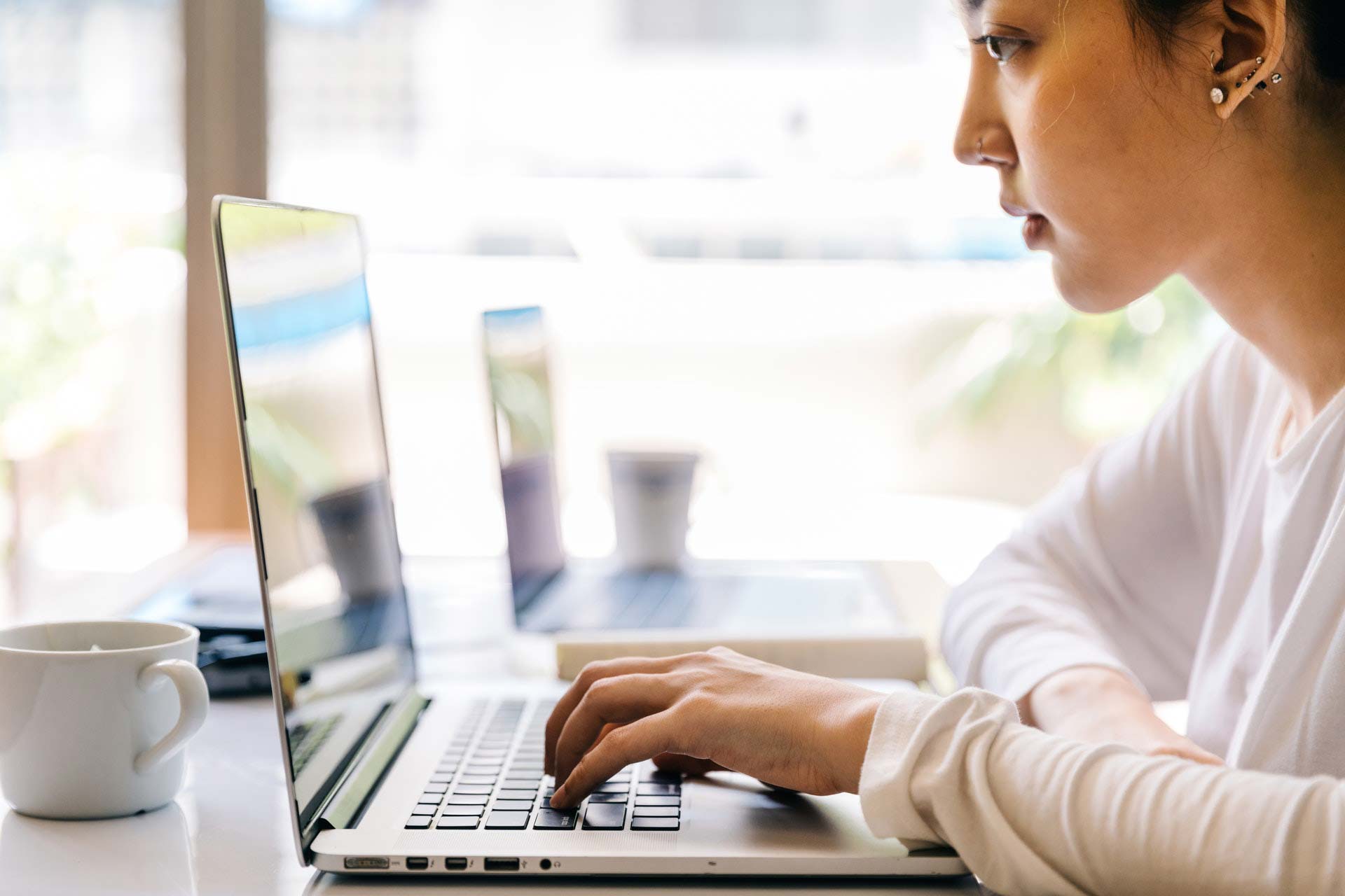 Young female student working on a laptop